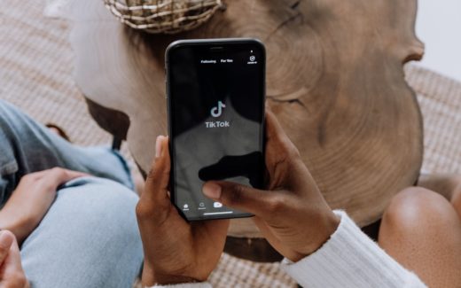 person holding black android smartphone